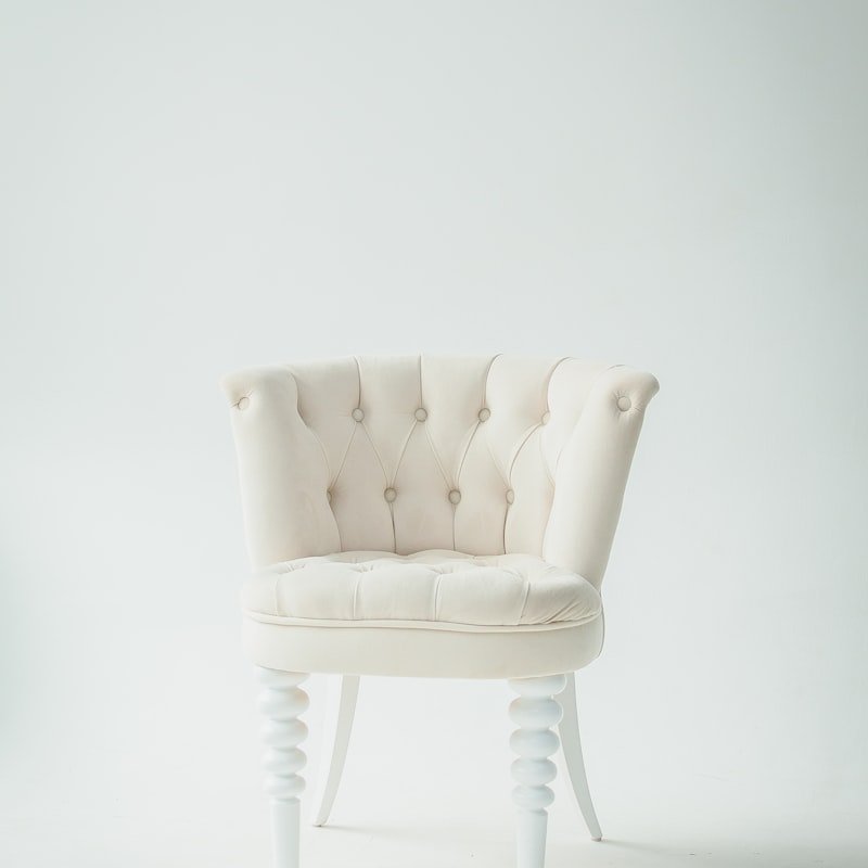 Fauteuil bouclé crème
